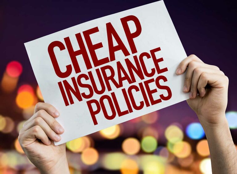 Cheap Insurance Policies Sign Held by picketer.