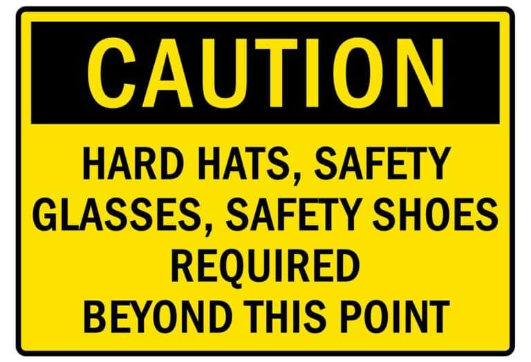Yellow Caution Sign for hard hats, safety glasses, safety shoes required beyond this point.
